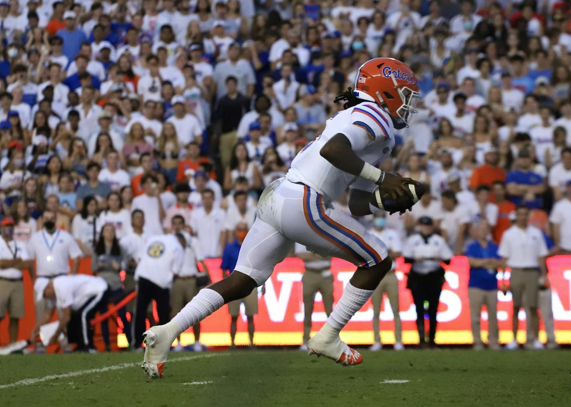 Florida's Emory Jones runs with the ball during the Gators' season opener on Sept. 4 against Florida Atlantic.