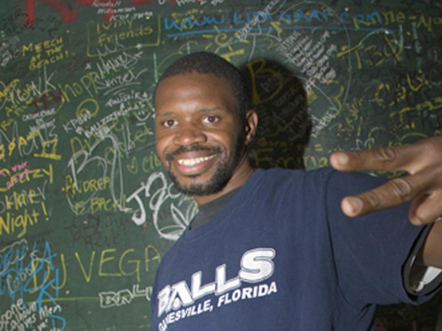 Jonathan Palmer-Gilley, aka Squirrel, a popular frequenter of midtown, is known for video-game-inspired posters he draws.