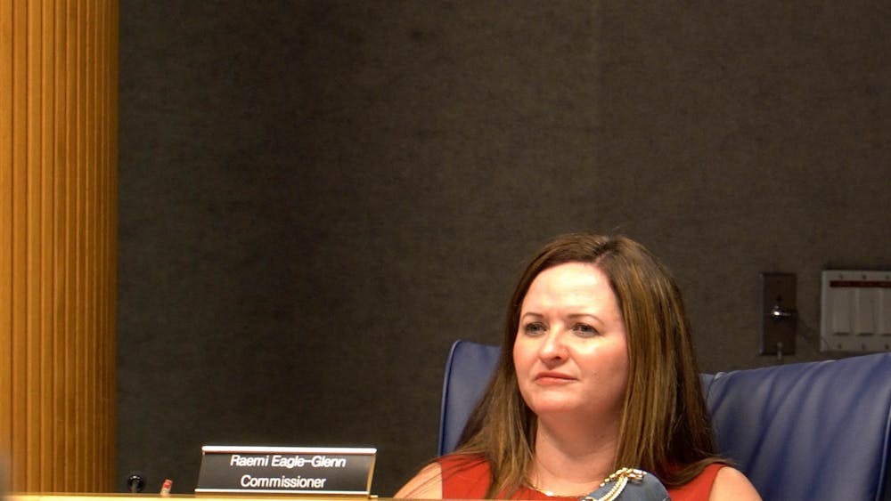 Raemi Eagle-Glenn, the newly appointed District 1 county commissioner, sits in special meeting to discuss overcrowding within the Alachua County Animal Resources and Care at the Jack Durrance Auditorium Tuesday, June 28, 2022.