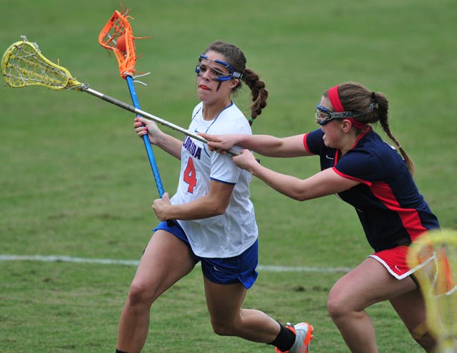 Florida junior attacker Kitty Cullen drives toward goal against Detroit on Feb. 26. Cullen returned from a concussion and scored a team-high five goals in the Gators’ 17-5 win against Vanderbilt on Saturday.