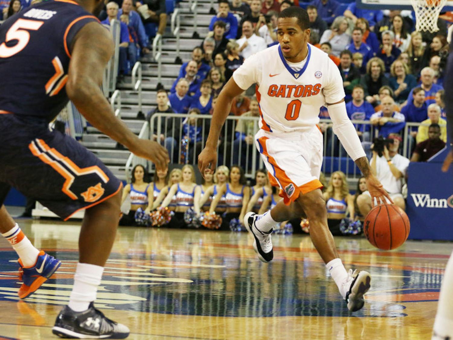 Kasey Hill drives into the paint during Florida's win against Auburn on Thursday in the O'Connell Center.