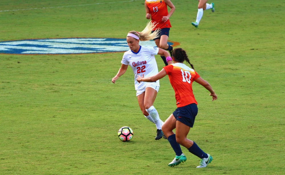 <p>Parker Roberts dribbles the ball during Florida's 2-1 win against Syracuse on August 27, at Donald R. Dizney Stadium.</p>