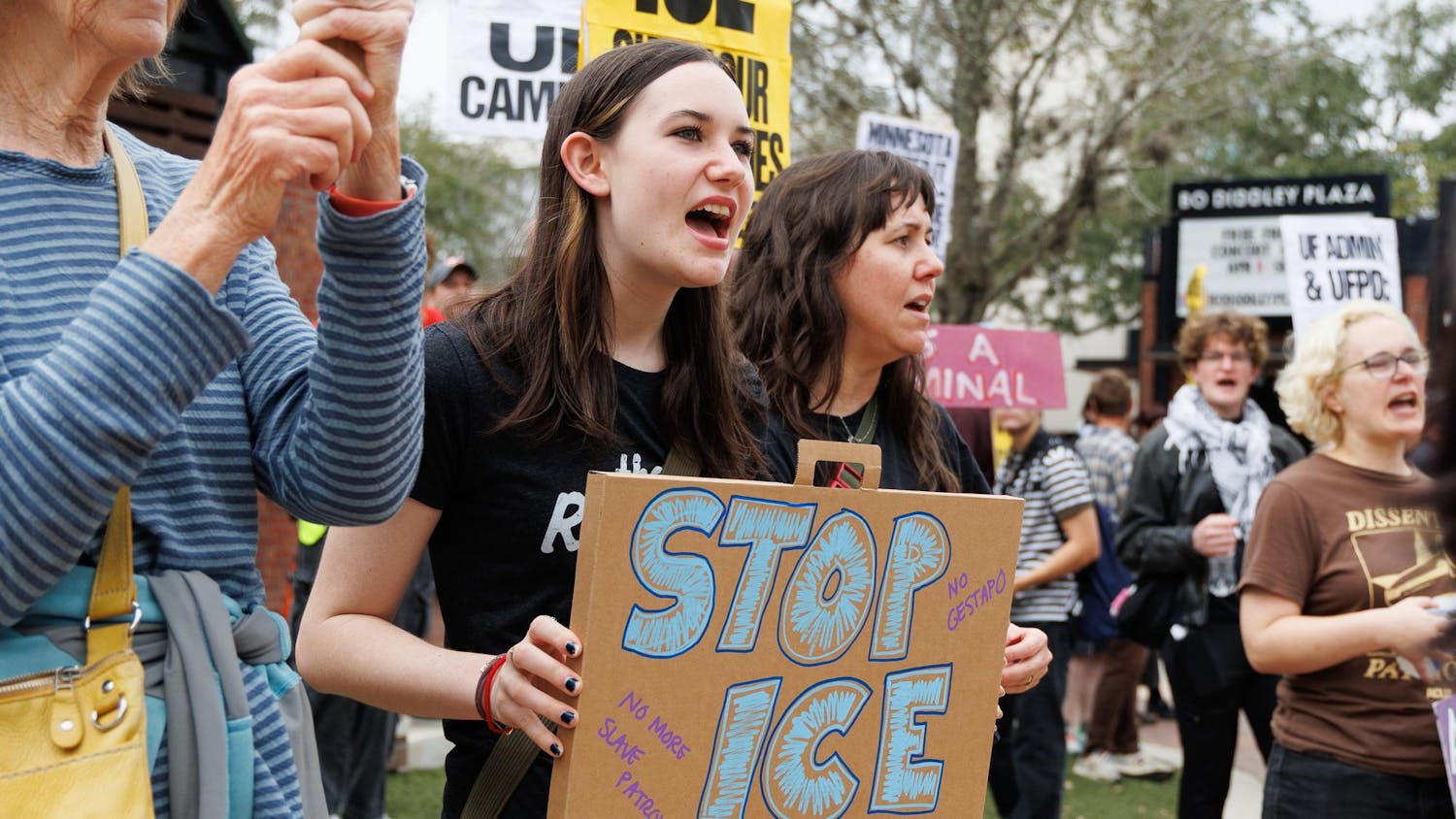 Protesters gather to criticize ICE's actions under the Trump administration at the Alachua County Clerk of Court, Sunday, Jan. 25, 2026.