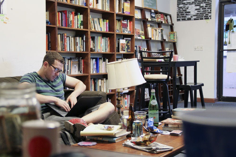 <p>David Astor, 28, sits in his bookstore, Broken Shelves, in downtown Gainesville. “It was more than I ever thought could come out of it,” Astor said of the soon-to-be-closed business. “The fact that it was met with such immediate and overwhelming delight and praise was great.”</p>