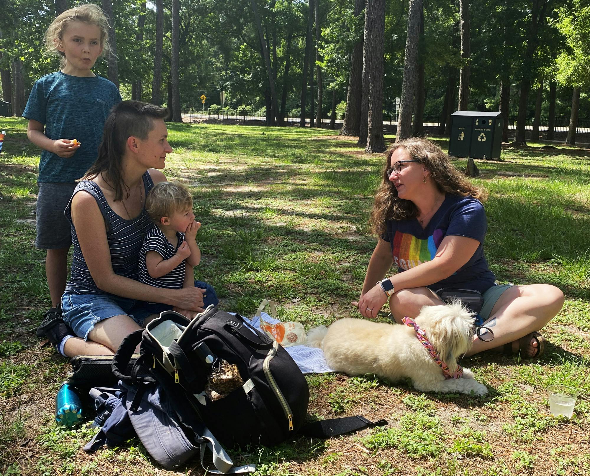 Attendees of the Pride Center Community meeting picnic and collaborate in groups to discuss their goals for the upcoming year on Saturday, June 12, 2021. The event brought together families and members of the LGBTQ+ community to give their input in rejuvenating the center while helping themselves to a catered breakfast at Westside Park.