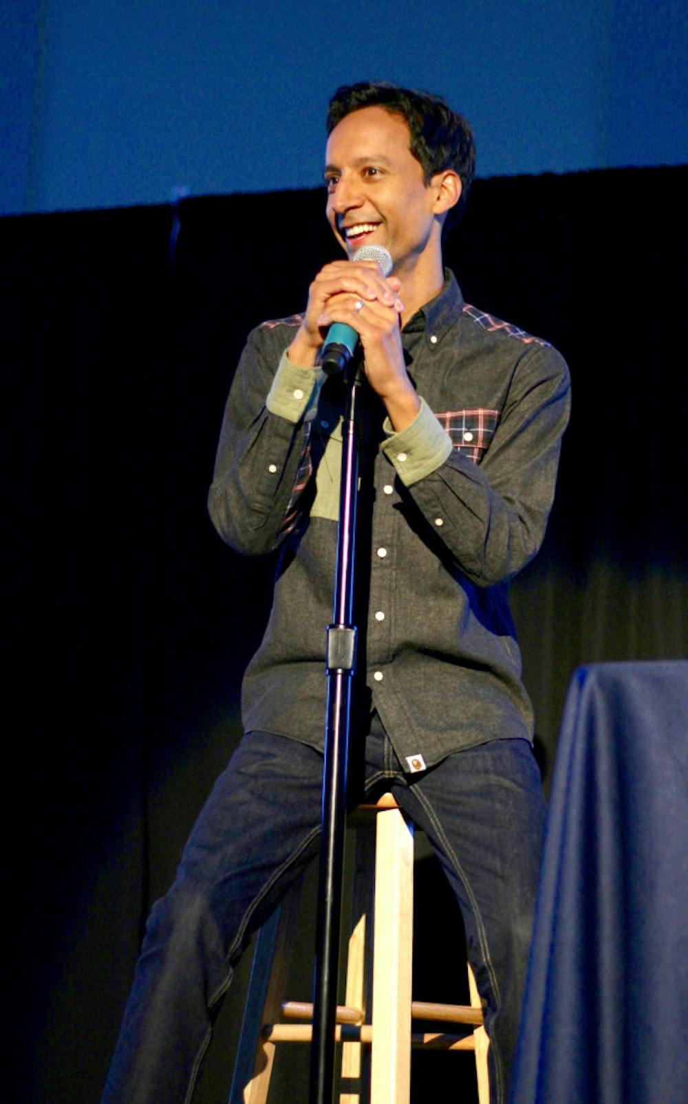 <p>Comedian Danny Pudi jokes about his unique multicultural background at Reitz Union Board Entertainment's event in the Reitz Union Rion Ballroom on Wednesday night. "I am half-Indian, half-Polish, so that means during the day I run a convenience store, and at night, I clean it," Pudi said.</p>