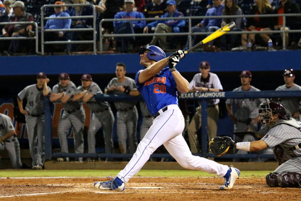 Peter Alonso follows through on a swing during Florida's 10-4 loss to Mississippi State on April 9, 2016, at McKethan Stadium.