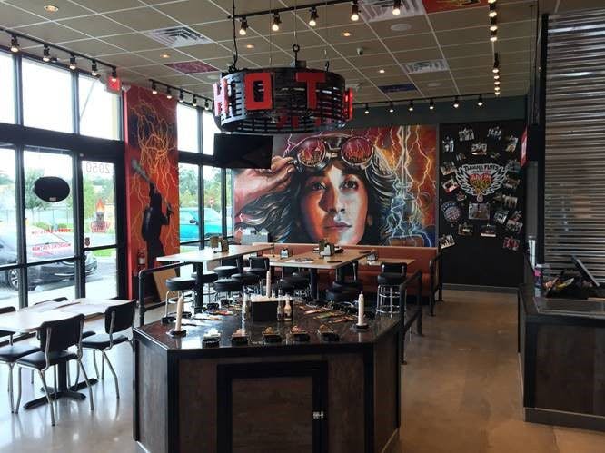 The new Tijuana Flats in Butler Plaza North will feature a custom mural and a hot bar with 15 hot sauce pumps for customers to choose from.