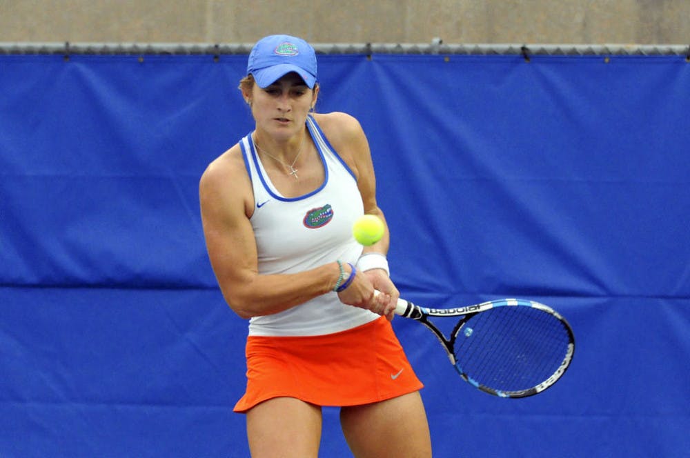 <p>UF's Kourtney Keegan hits the ball during Florida's 6-1 win over USF on Jan. 27 at the Ring Tennis Complex.</p>