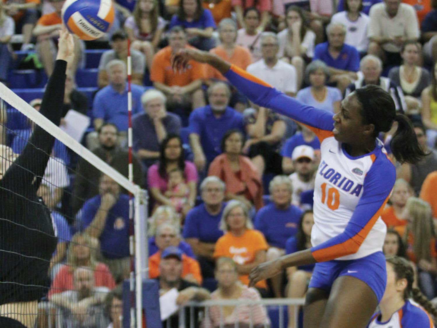 Junior middle-blocker Chloe Mann attacks the Missouri defense. Florida won the match 3-0 at the Stephen C. O'Connell Center on Friday night.