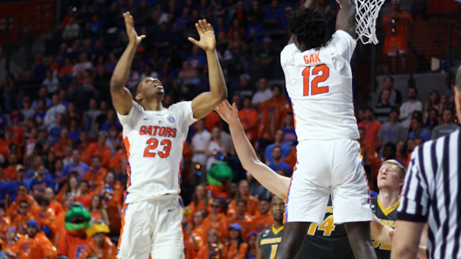 Gorjok Gak (right) is competing for Australia in the World University Games in Taipei. Through eight games, the rising sophomore averaged 11.1 points a game.