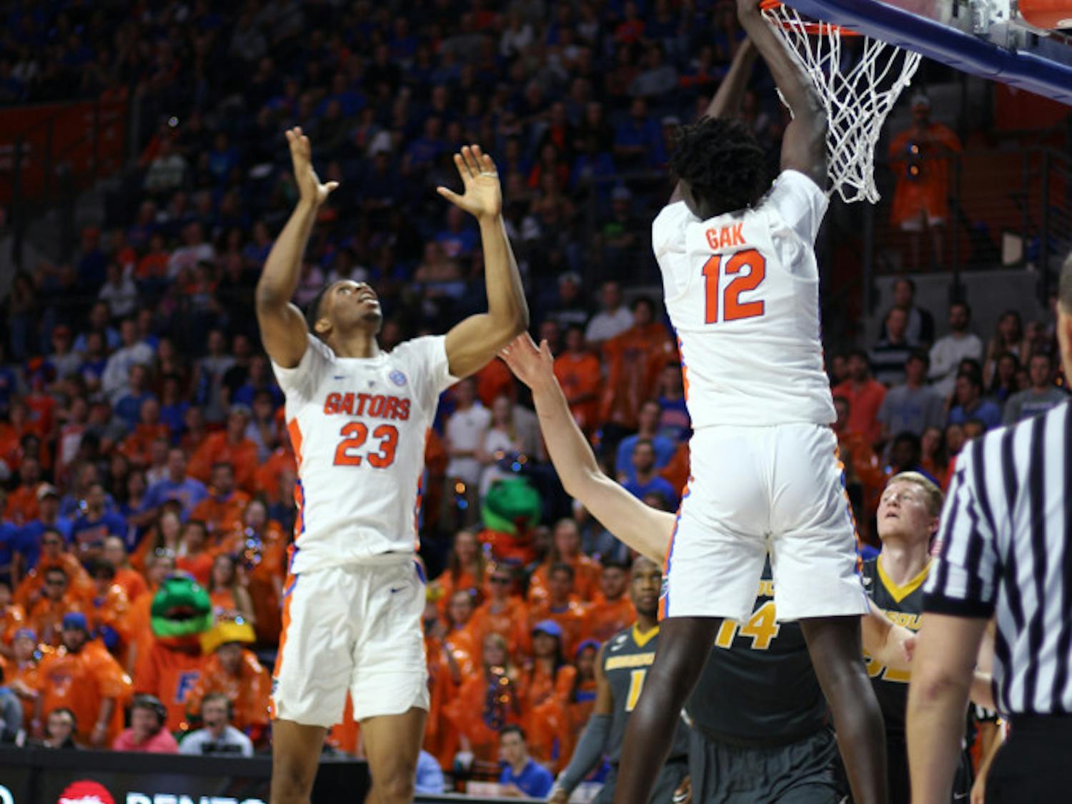 Gorjok Gak (right) is competing for Australia in the World University Games in Taipei. Through eight games, the rising sophomore averaged 11.1 points a game.