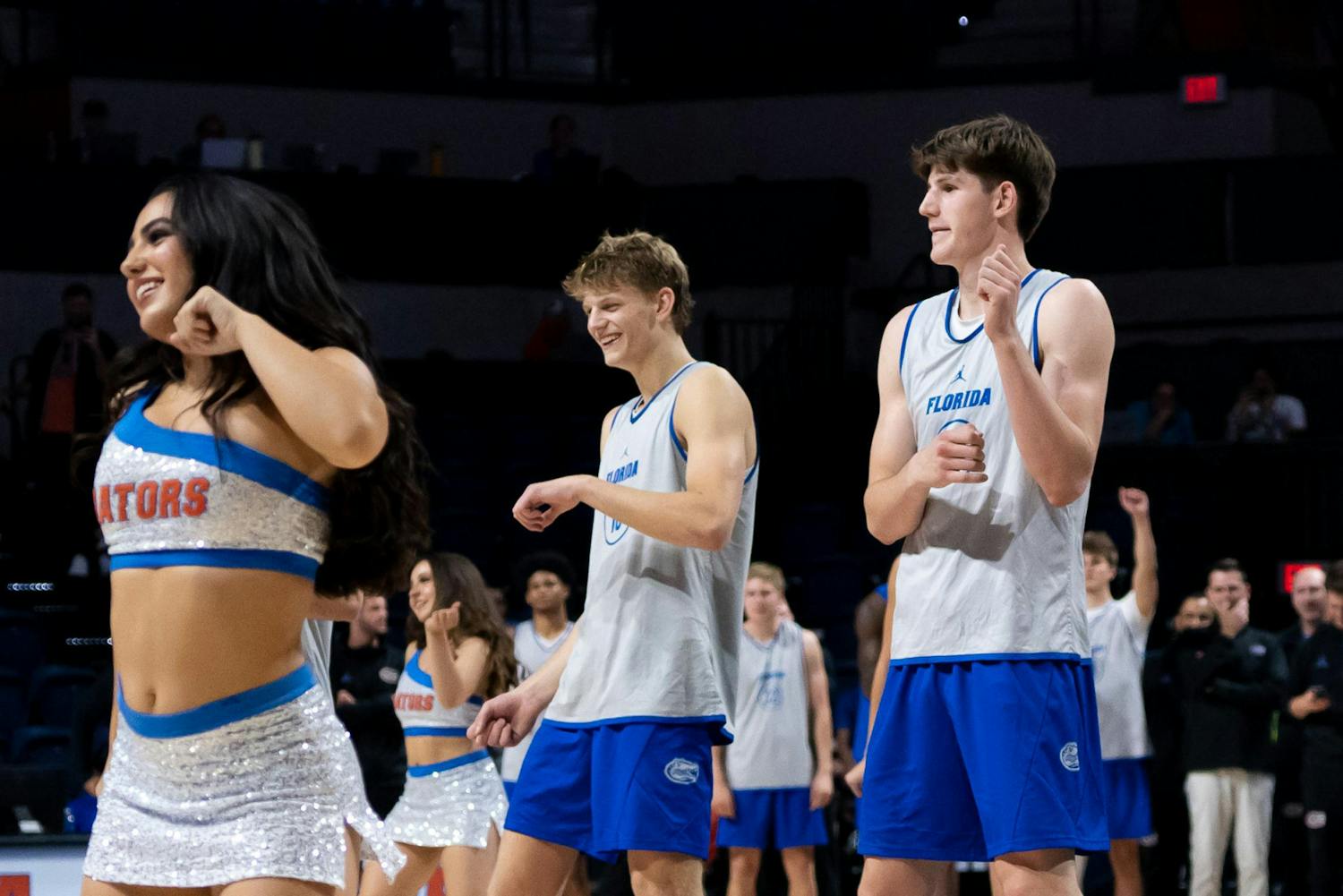 Alex Condon and Thomas Haugh dance with the Gator Dazzlers during the Orange & Blue Scrimmage in the Exactech Arena on Thursday, Nov. 2, 2023.