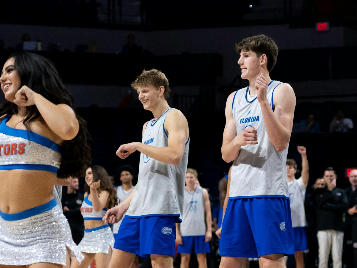 Alex Condon and Thomas Haugh dance with the Gator Dazzlers during the Orange & Blue Scrimmage in the Exactech Arena on Thursday, Nov. 2, 2023.
