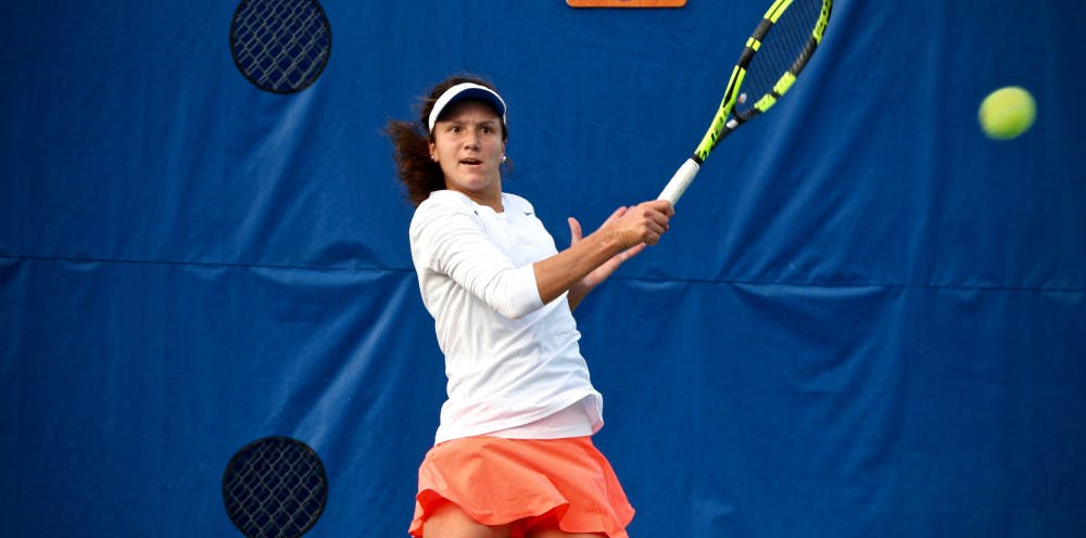 <p>Junior Anna Danilina hits a forehand during Florida's 4-2 win over Oklahoma State on Feb. 18, 2017, at the Ring Tennis Complex.</p>
