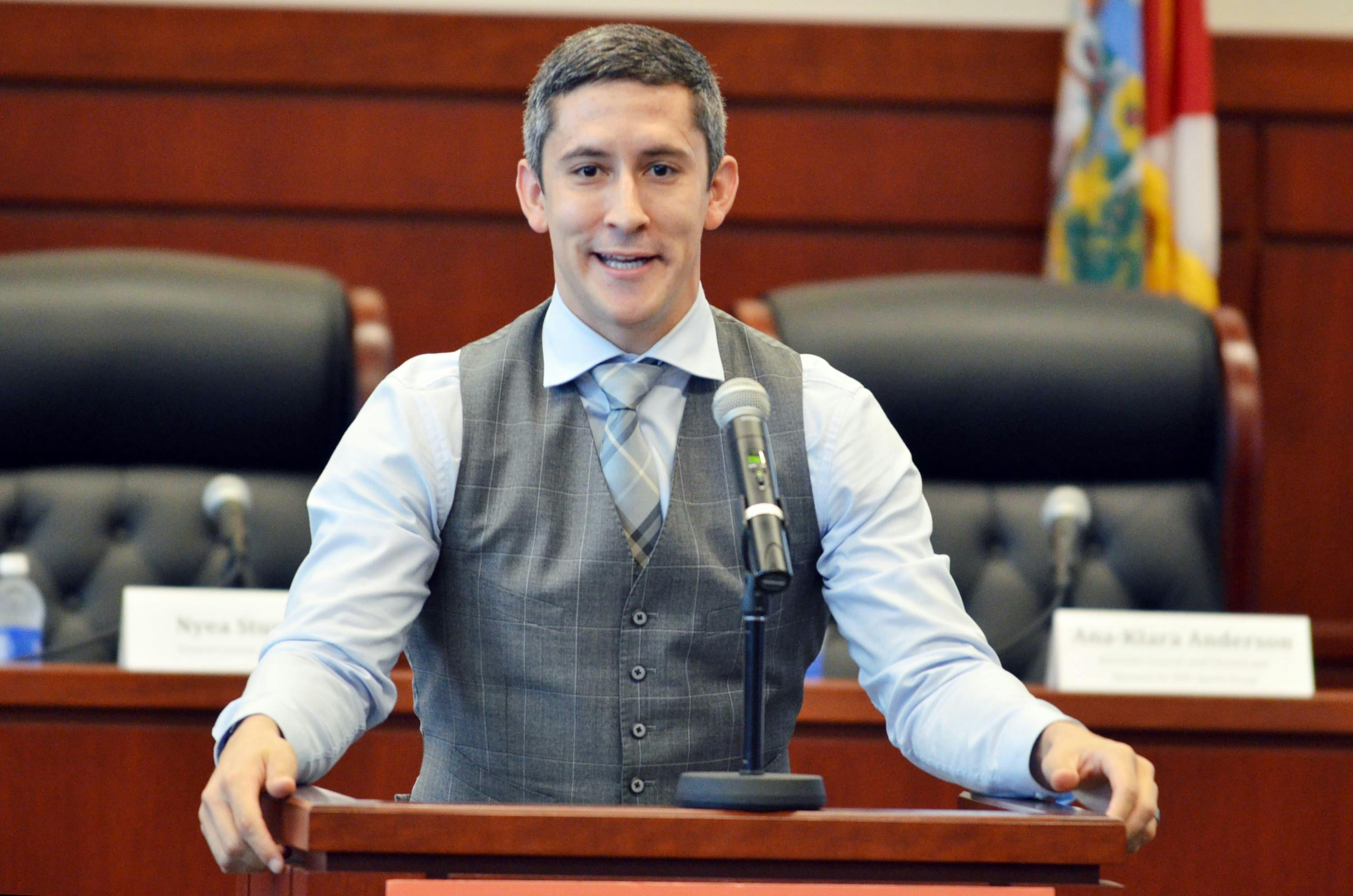 Rand Getlin speaks during the UF Entertainment and Sports Law Society's symposium on ethical and legal decision-making in the sports industry on Friday.