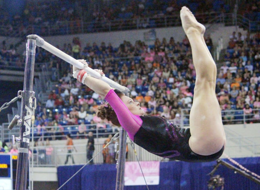 <p>Bridget Sloan performs on the balance beam during UF’s 198.125 - 197.625 win over LSU Feb. 21 in the O’Connell Center. Florida starts competing in the NCAA Regionals on Saturday in University Park, Penn.</p>
