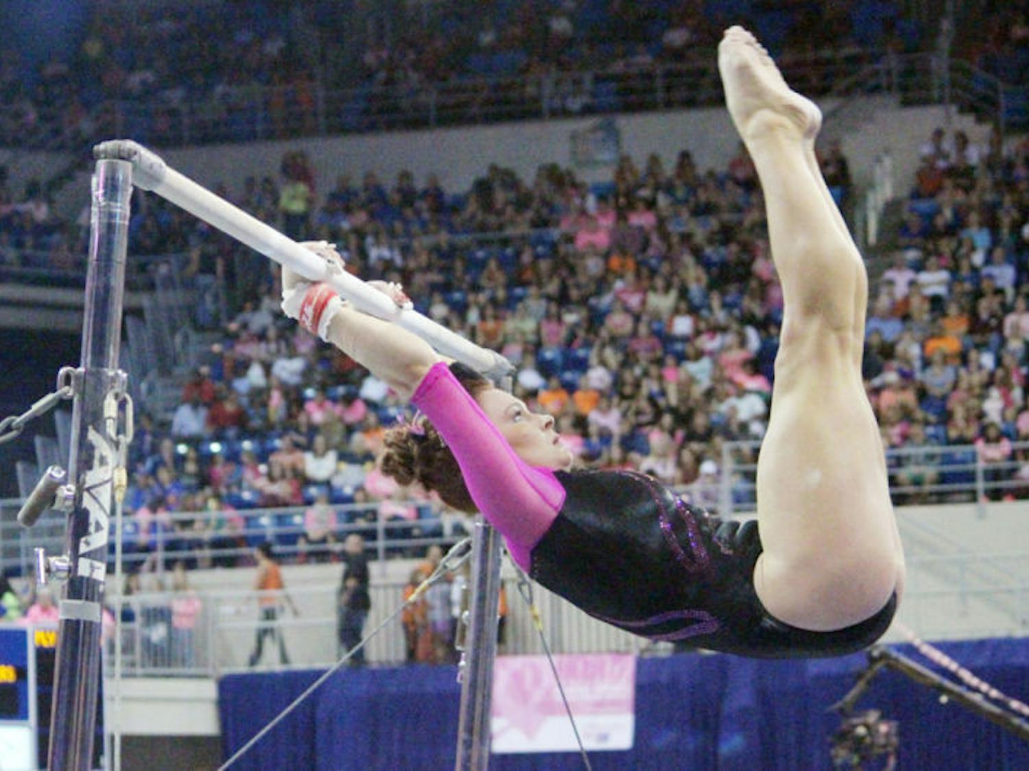 Bridget Sloan performs on the balance beam during UF’s 198.125 - 197.625 win over LSU Feb. 21 in the O’Connell Center. Florida starts competing in the NCAA Regionals on Saturday in University Park, Penn.
