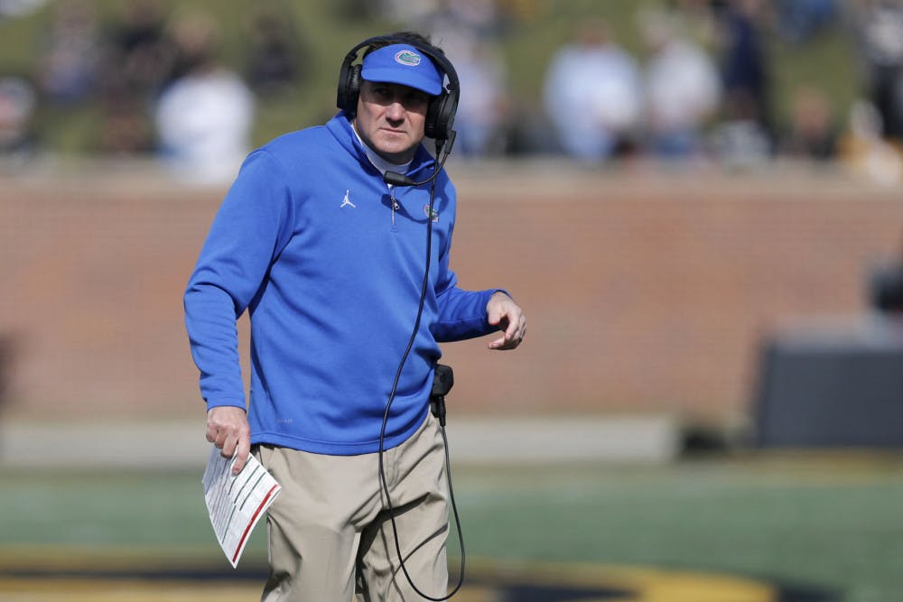 Florida head coach Dan Mullen watches from the sidelines during the first half of an NCAA college football game against Missouri, Saturday, Nov. 16, 2019, in Columbia, Mo. (AP Photo/Jeff Roberson)
