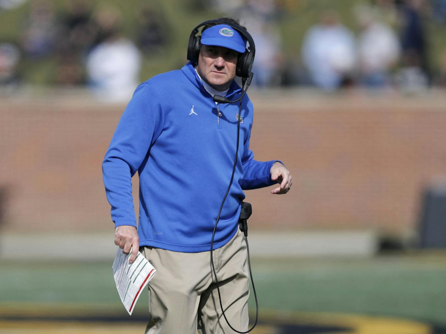 Florida head coach Dan Mullen watches from the sidelines during the first half of an NCAA college football game against Missouri, Saturday, Nov. 16, 2019, in Columbia, Mo. (AP Photo/Jeff Roberson)