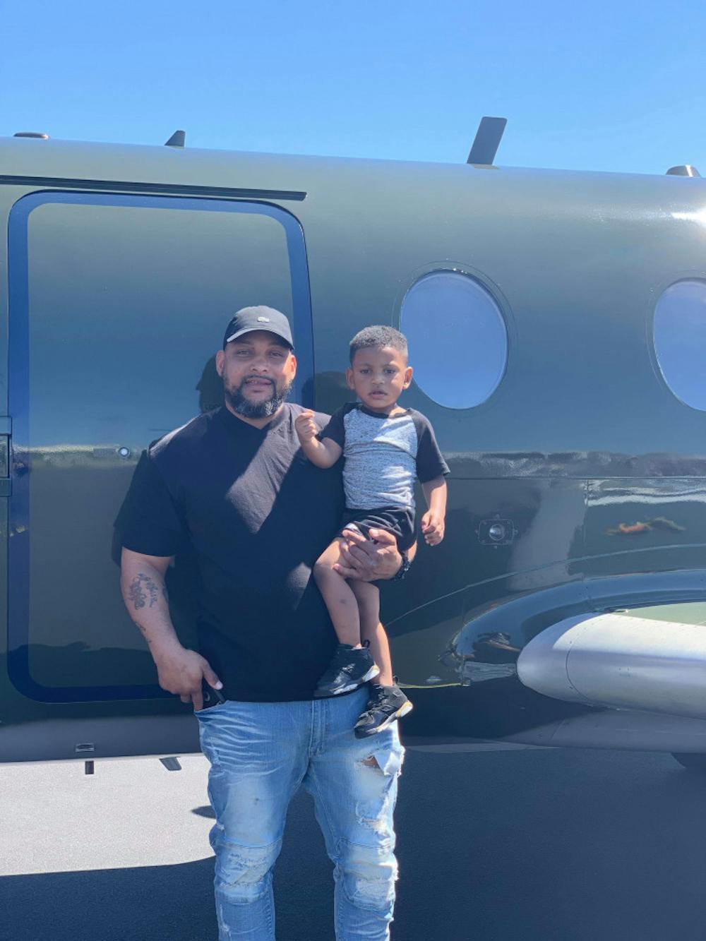 <p>Craig Brewer and his son Corrian, 2, went to look at helicopters the weekend before Brewer was shot and killed at a Waffle House.</p>