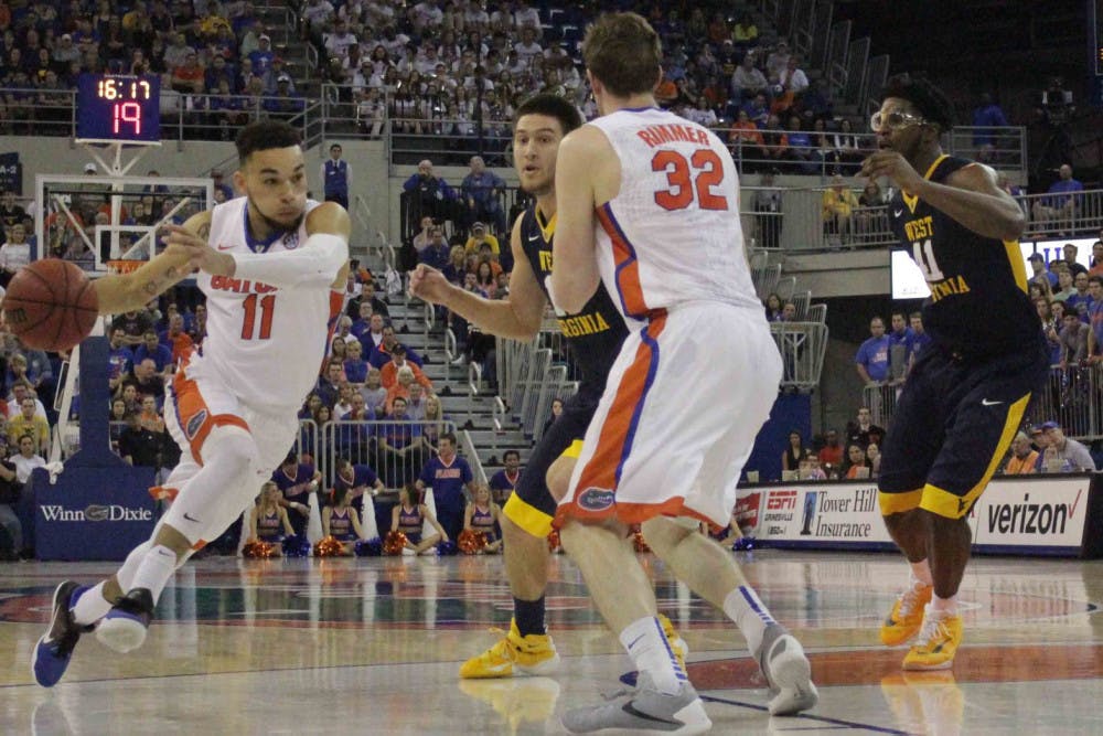 Chris Chiozza drives into the paint during Florida’s win over West Virginia on Jan. 30, 2016, in the O’Connell Center.