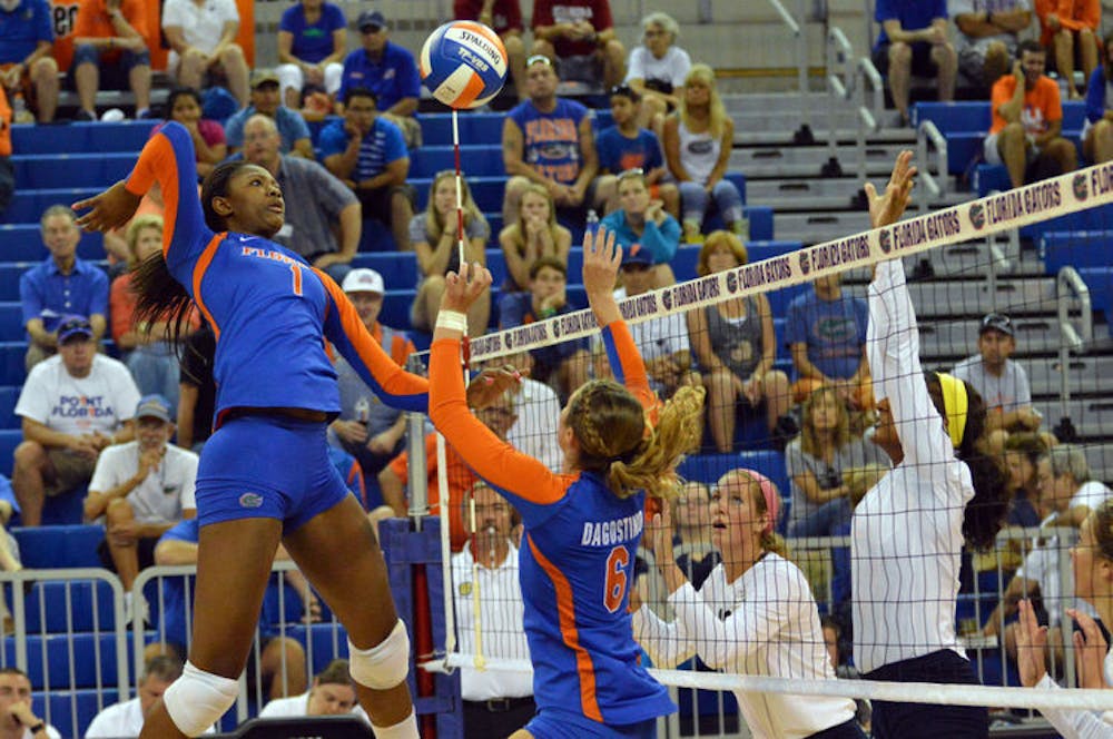 <p><span>Senior middle blocker Rhamat Alhassan swings for a kill during Florida's 3-0 win against Georgia Southern on&nbsp;</span><span class="aBn" data-term="goog_1268147910"><span class="aQJ">Aug. 29</span></span><span>&nbsp;in the O'Connell Center.</span></p>