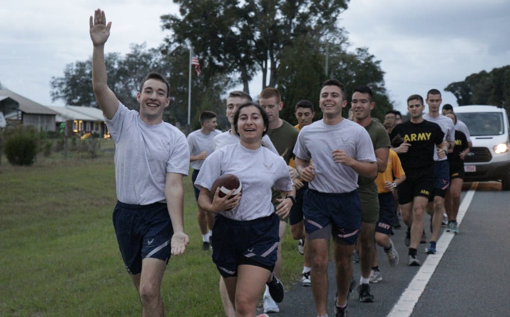 <div class="gs"><div id=":tx" class="ii gt"><div id=":tw" class="a3s aXjCH"><div dir="ltr">UF Air Force ROTC cadets Jake Gold (left), Destiny Cepero, and Jonathan Toledo hold the game ball during the relay on their way to Gainesville.</div></div></div></div>