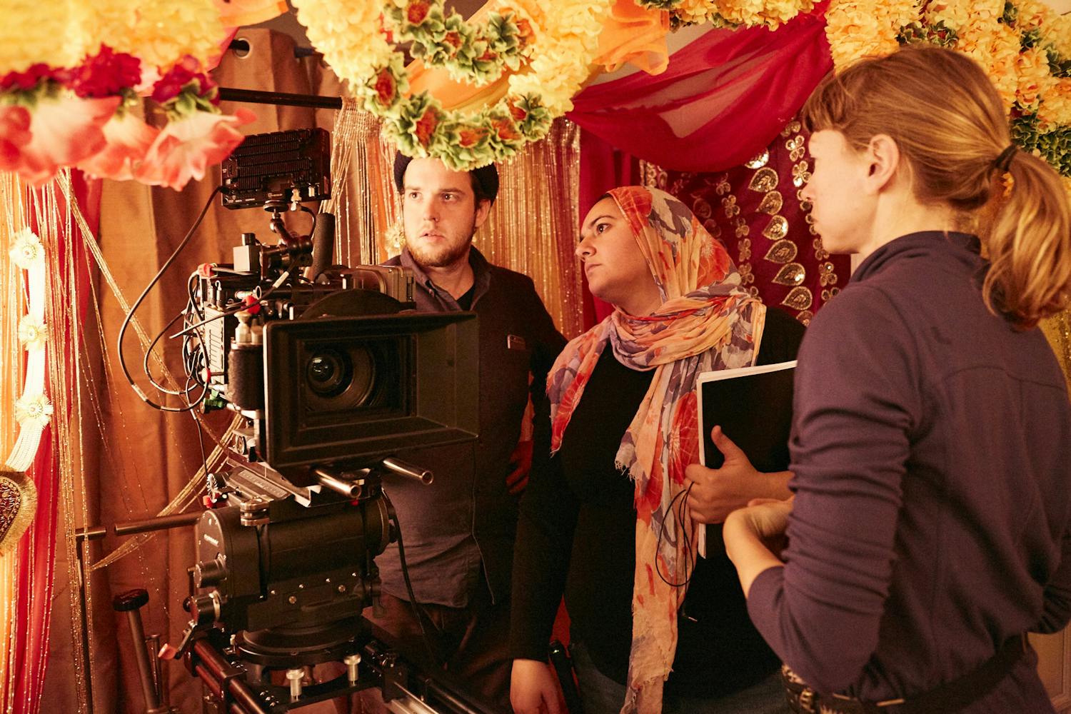 UF lecturer Iman Zawahry sets up a shot on set of ‘Americanish’ by looking through the viewfinder.