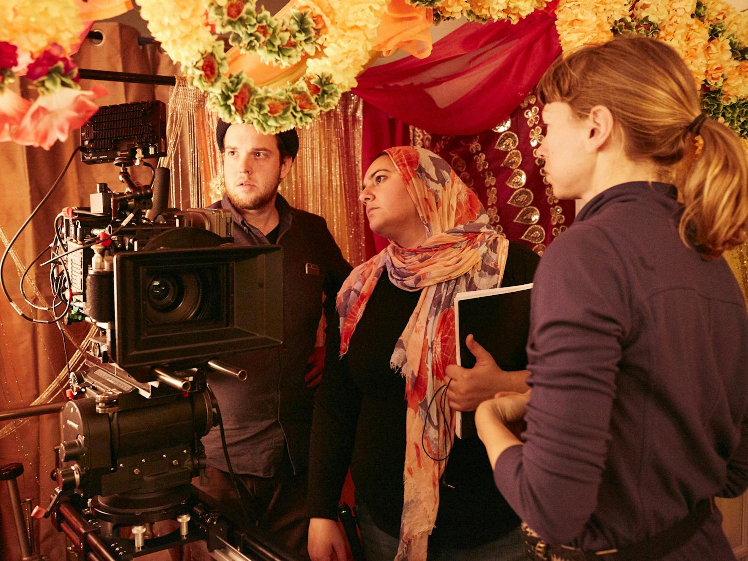 UF lecturer Iman Zawahry sets up a shot on set of ‘Americanish’ by looking through the viewfinder.