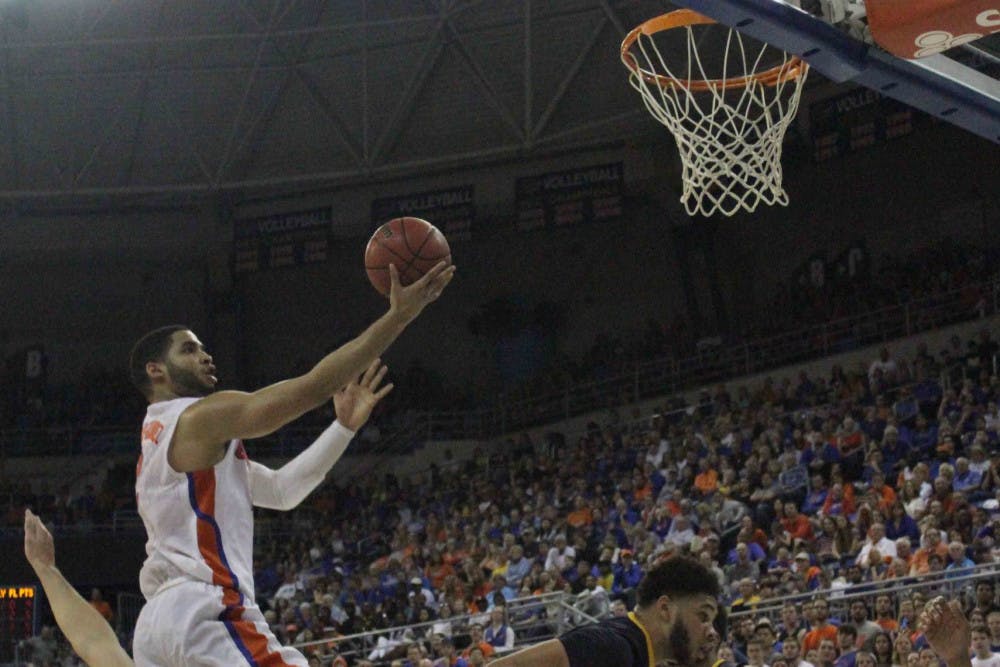 Brandone Francis-Ramirez goes for a layup during Florida’s win over West Virginia on Jan. 30, 2016, in the O’Connell Center.