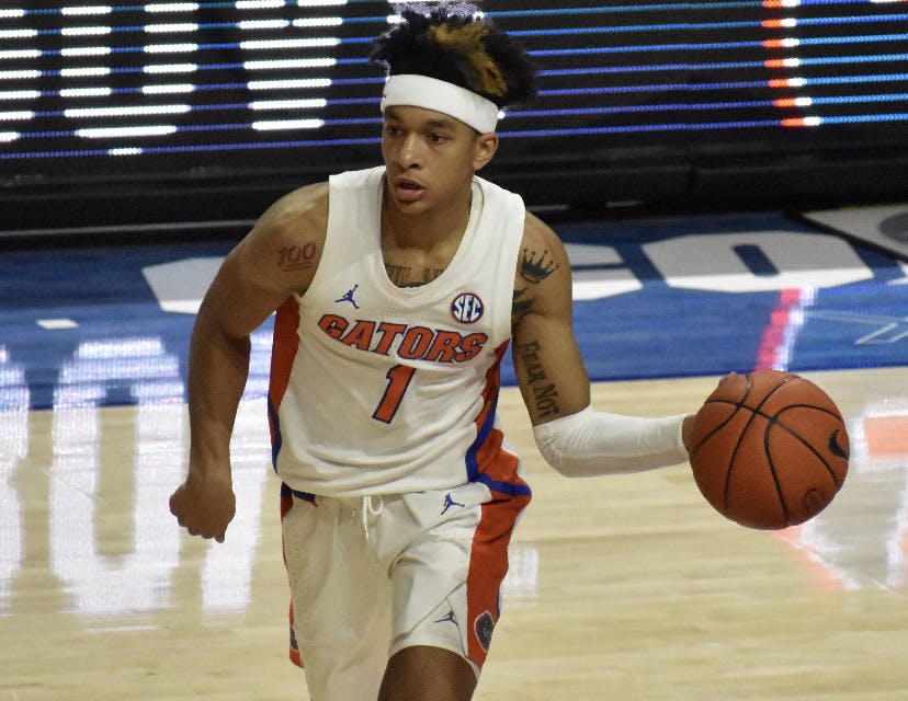 Junior Tre Mann drives left against Missouri Wednesday night. His 21 points led all scores against the Tigers.