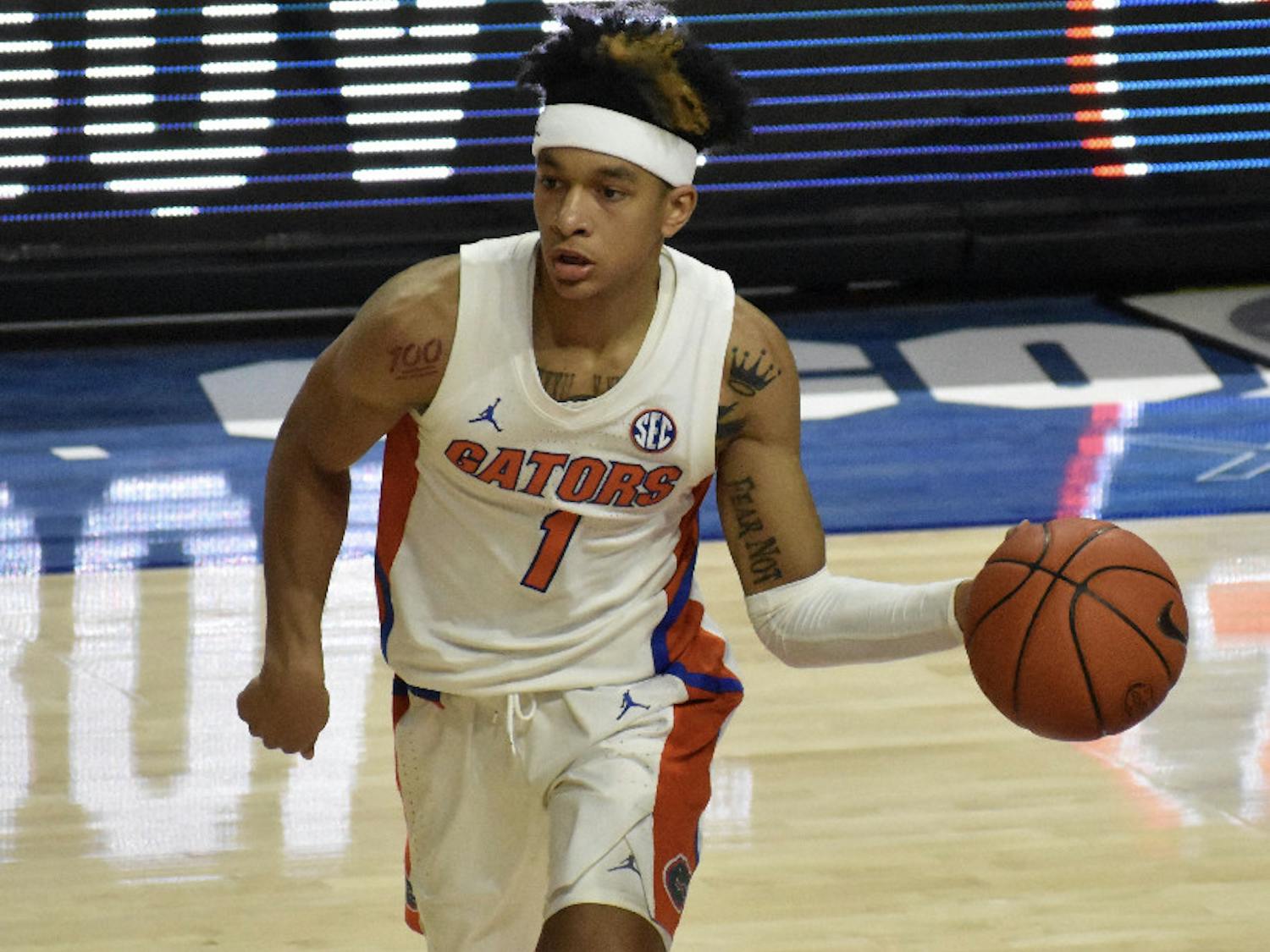 Junior Tre Mann drives left against Missouri Wednesday night. His 21 points led all scores against the Tigers.