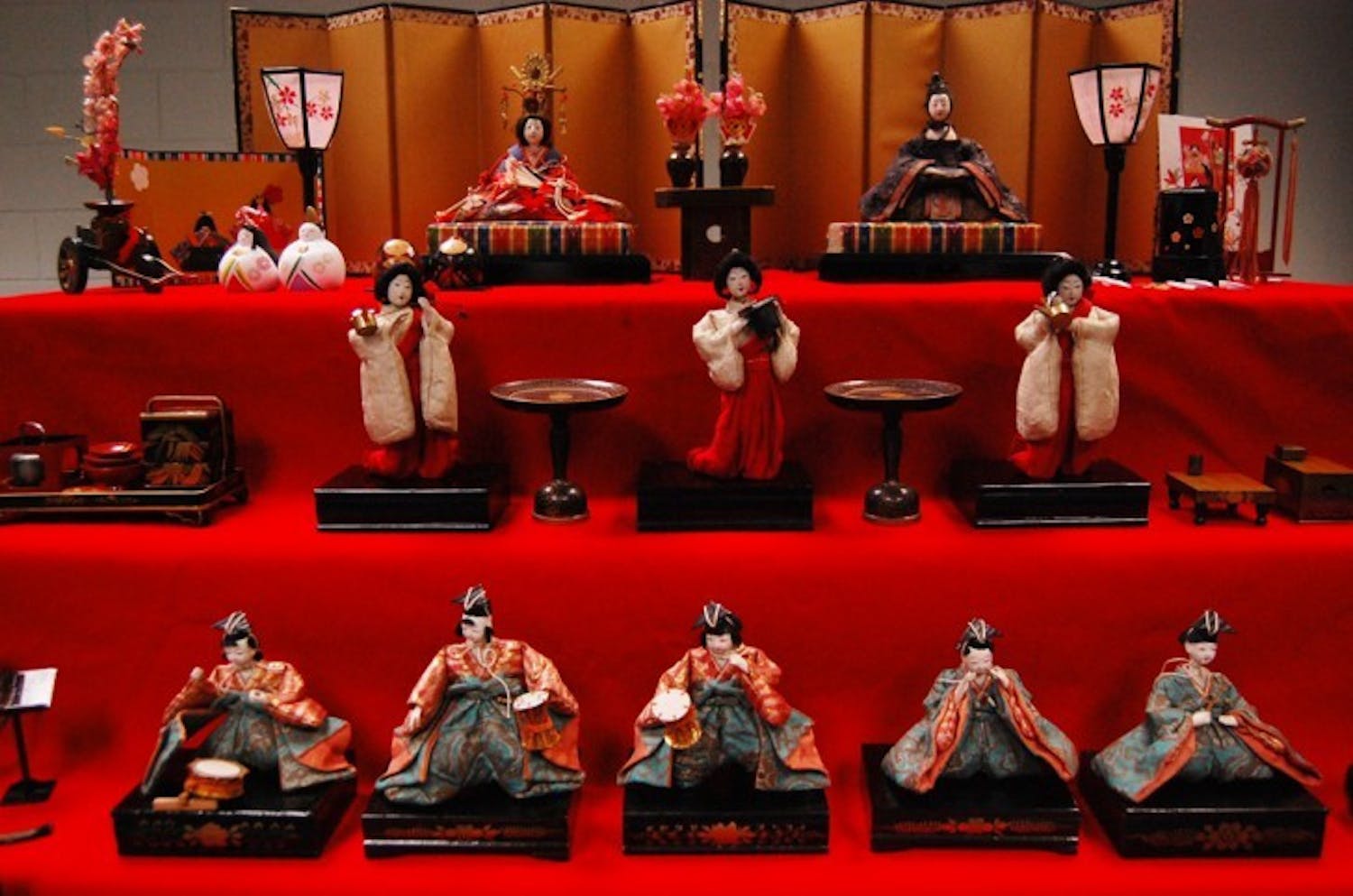 A display of Japanese dolls sits on display in the Language Learning Center in Turlington Hall. In Japan, mothers and their daughters set up similar doll displays as part of the Doll's Festival, which is also known as Momo no Sekku, or Peach Festival.