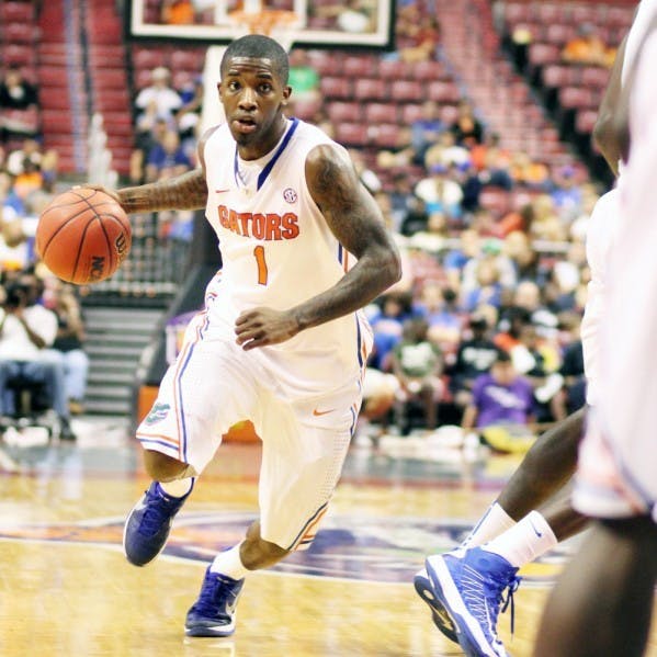 Senior guard Kenny Boynton drives to the basket during Florida's 78-61 victory against Air Force at the Orange Bowl Classic on Saturday in Sunrise, Fla. Boynton shook off recent shooting troubles en route to a 14-point performance.