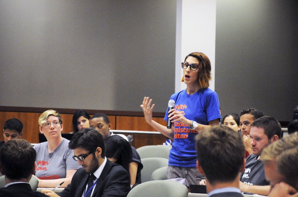 Lia Merivaki, a UF political science doctoral student and the co-president for Graduate Assistants United, speaks during the UF student goal-setting town hall meeting on June 7 at the Levin College of Law.
