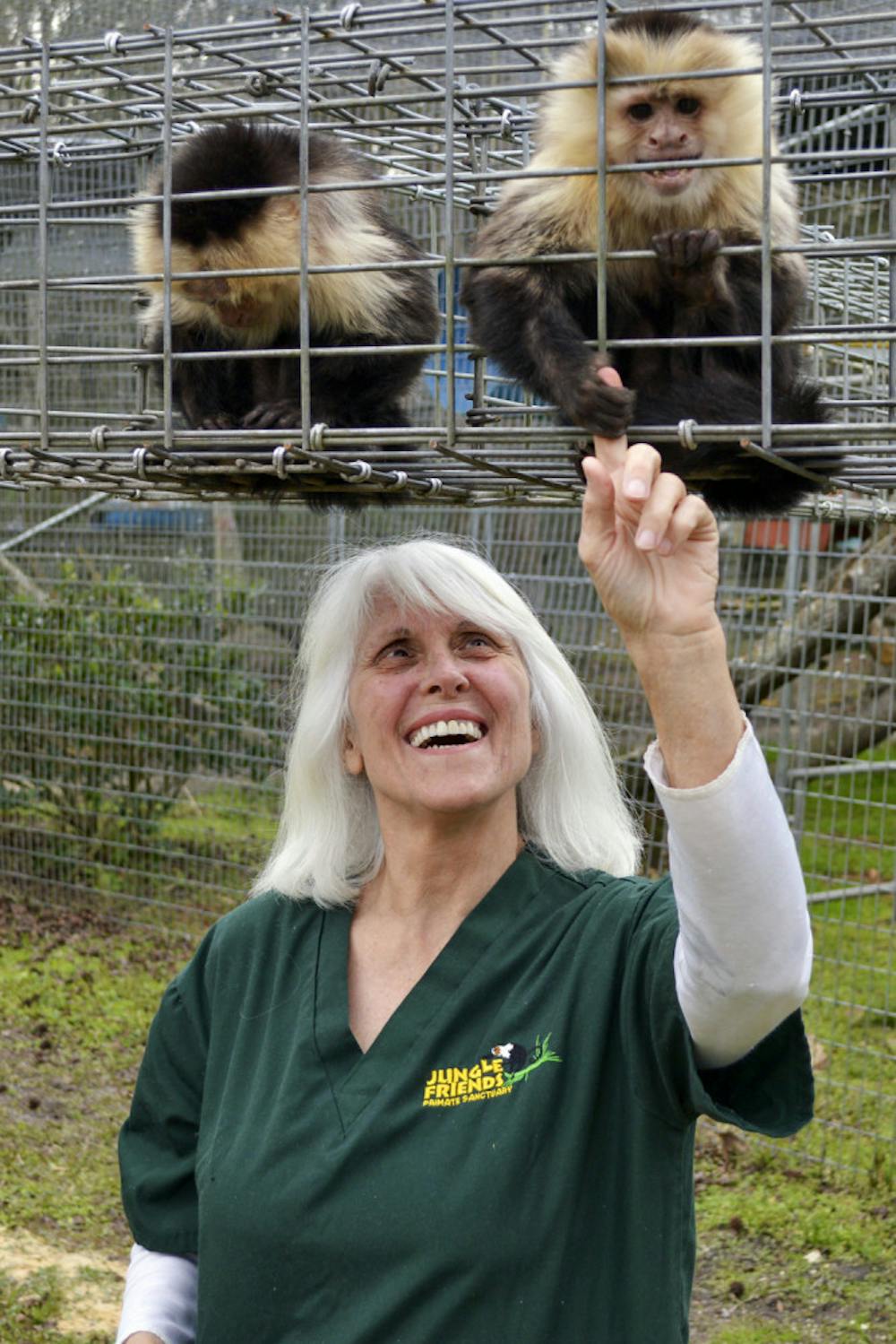 <p><span id="docs-internal-guid-8d59c52b-5d3d-6bf7-765f-ed09e7706954"><span>Samantha and Charlotte, a pair of white-faced capuchin monkey sisters, sit above their owner, 61-year-old Kari Bagnall, in the Jungle Friends Primate Sanctuary on Tuesday afternoon.</span></span></p>