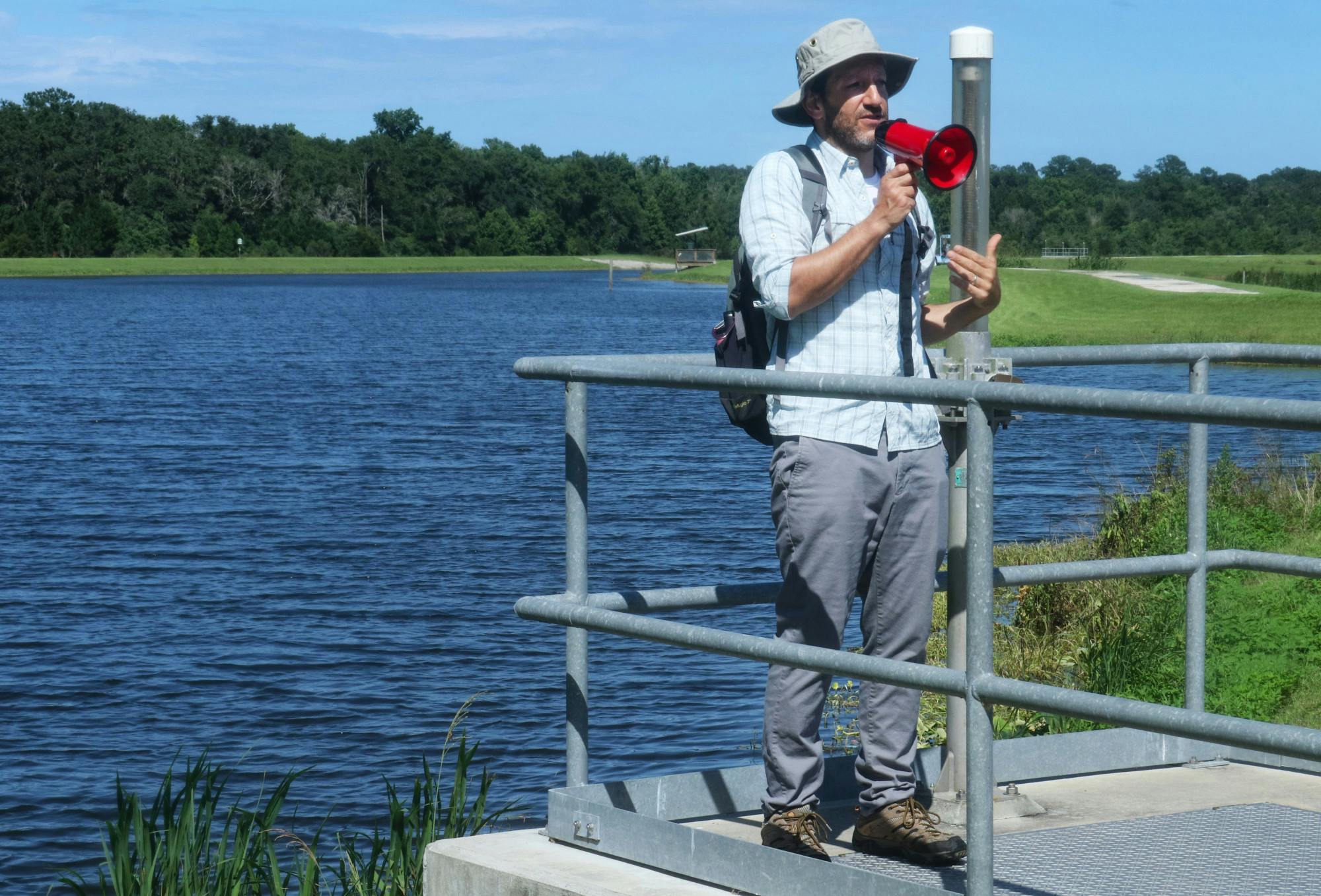 David Kaplan, an associate environmental engineering professor at UF, gives the Summer Engineering Experience for Kids attendees a tour of Sweetwater Wetlands Park on Monday, June 28, 2021. Kaplan hopes the camp can serve as "motivation to look to nature for a way to design things that minimize human impact."