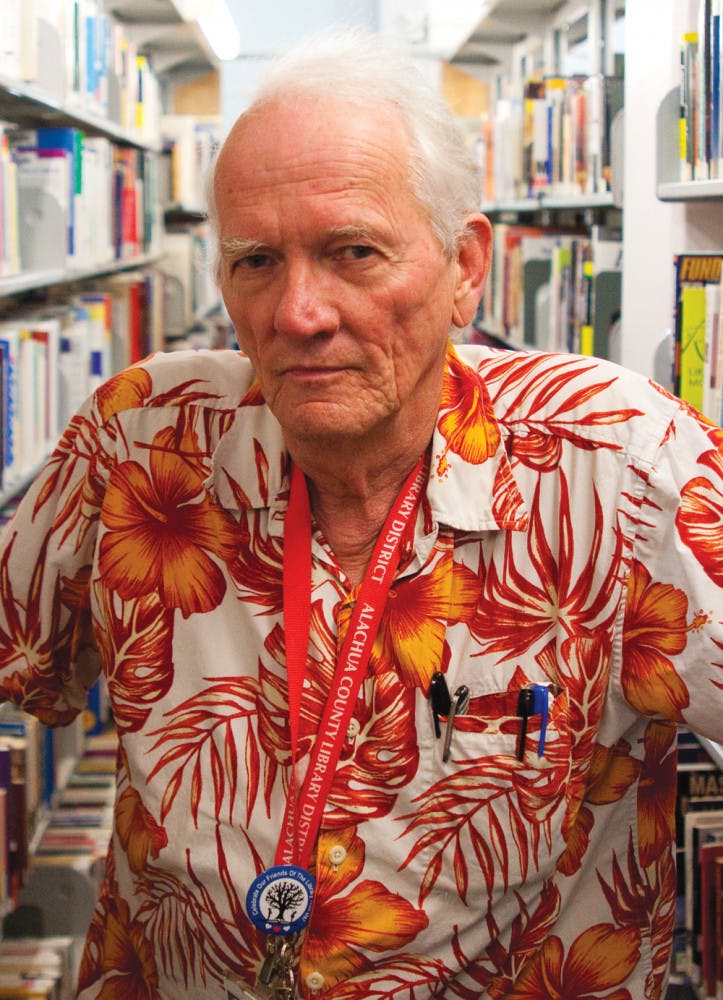 Al Martin, 69, is a librarian at Alachua County Tower Road Branch Library. Martin was one of the eight people chosen to receive a Carol Combs Hole Award for his work with non-native English speakers.