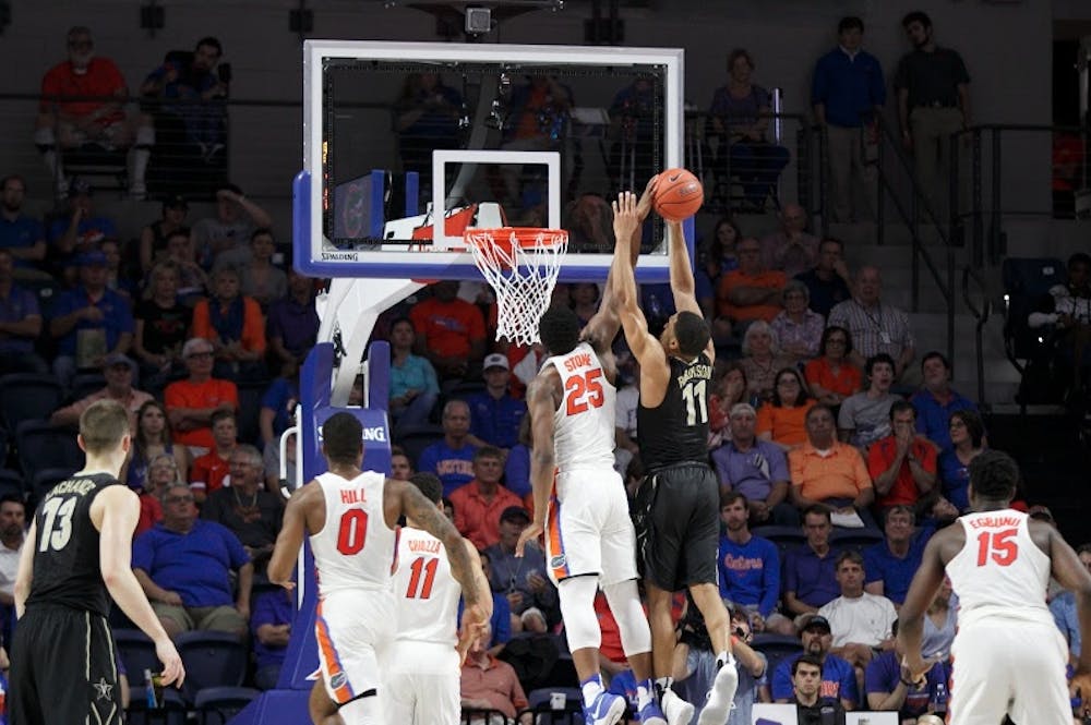 <p>UF forward Keith Stone blocks a shot during Florida's 68-66 loss to Vanderbilt on Jan. 21, 2017, in the O'Connell Center.</p>