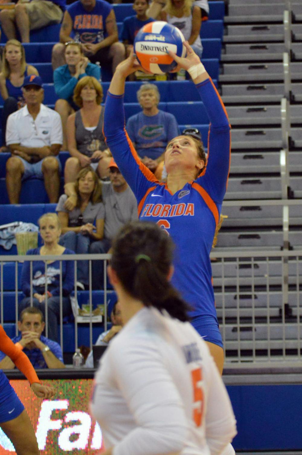 <p>Setter Mackenzie Dagostino sets the ball during Florida's 3-0 win against Georgia Southern on Friday in the O'Connell Center.</p>