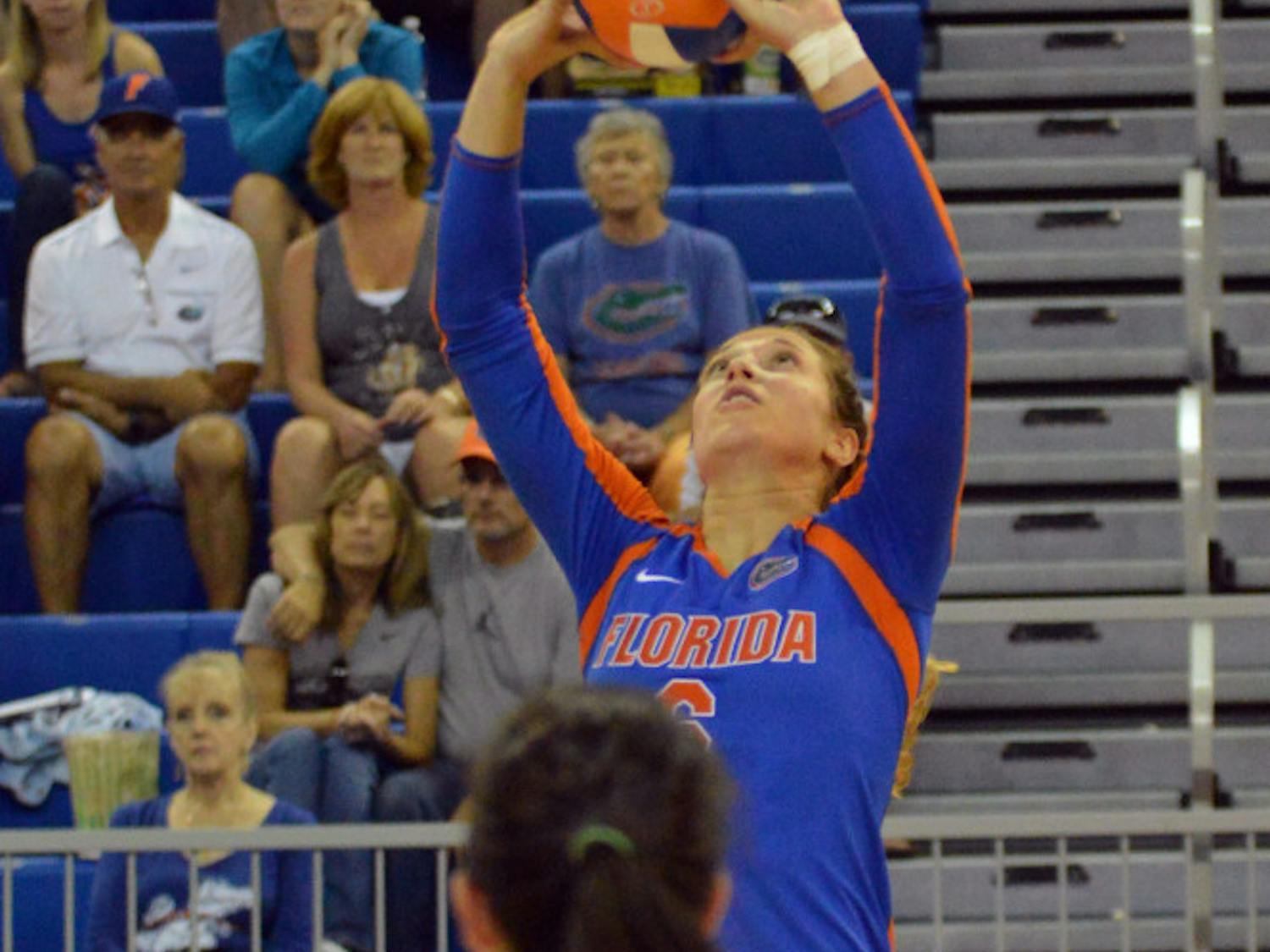 Setter Mackenzie Dagostino sets the ball during Florida's 3-0 win against Georgia Southern on Friday in the O'Connell Center.