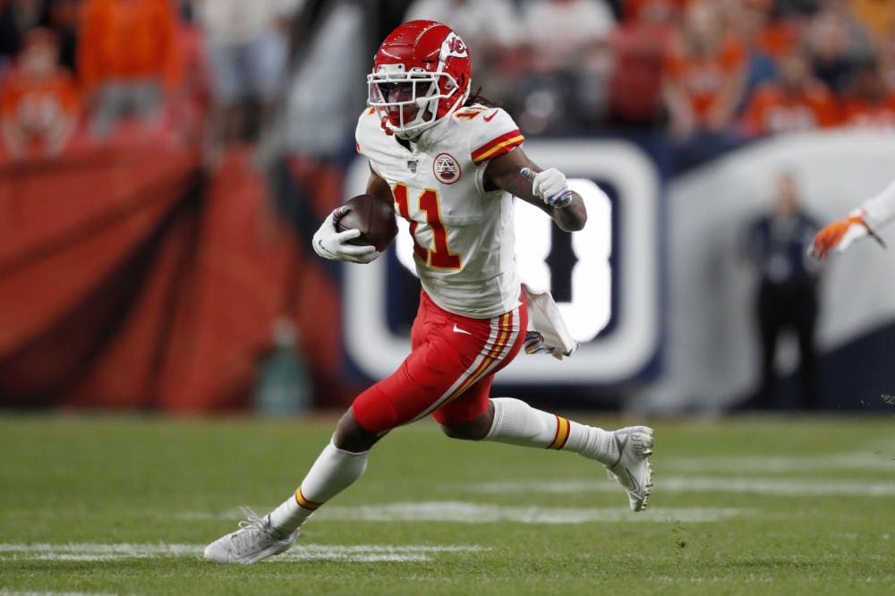 Kansas City Chiefs wide receiver Demarcus Robinson runs the ball against the Denver Broncos on Oct. 17 in Denver.
