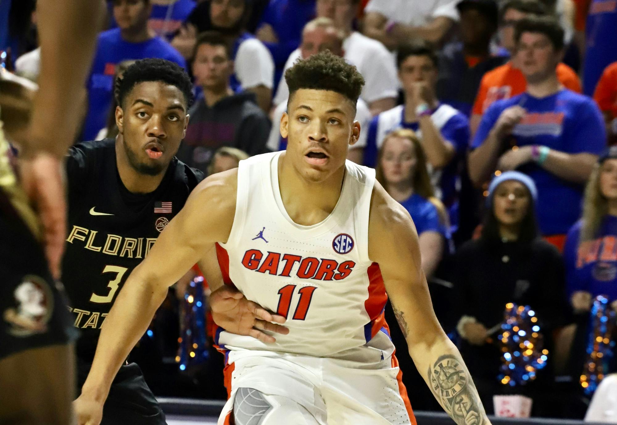 Junior Keyontae Johnson collapsed at midcourt Saturday after a timeout during Florida's game against rival FSU.