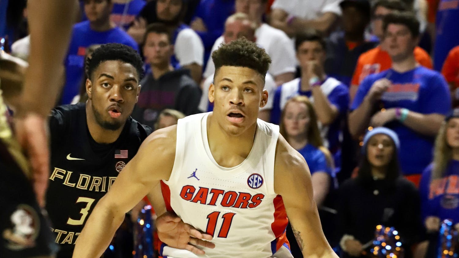 Junior Keyontae Johnson collapsed at midcourt Saturday after a timeout during Florida's game against rival FSU.
