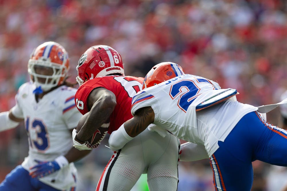 Florida Gators defensive back Dijon Johnson (27) makes a tackle during the first half at TIAA Bank Field on Saturday, November 02, 2024.