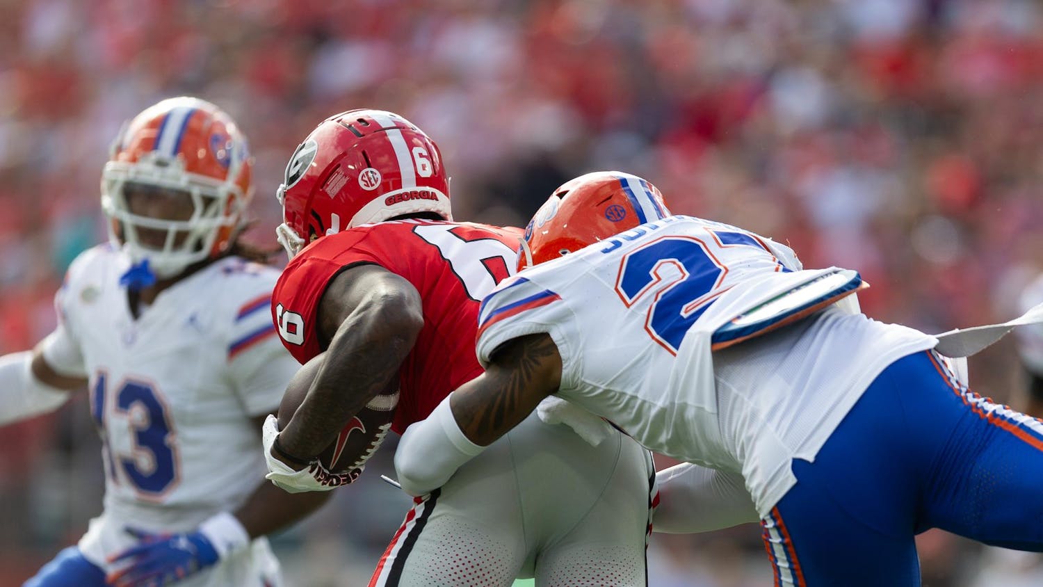 Florida Gators defensive back Dijon Johnson (27) makes a tackle during the first half at TIAA Bank Field on Saturday, November 02, 2024.