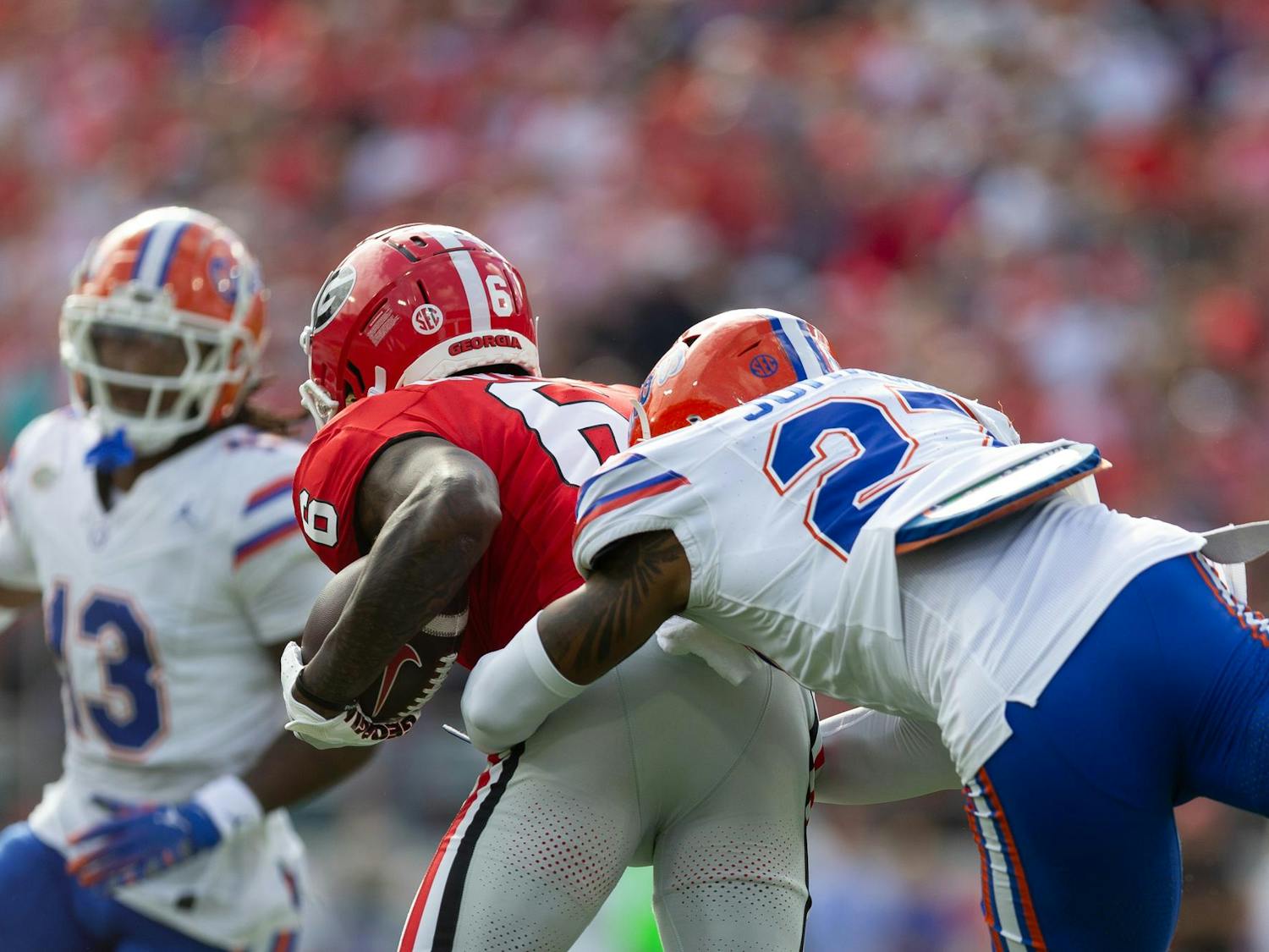 Florida Gators defensive back Dijon Johnson (27) makes a tackle during the first half at TIAA Bank Field on Saturday, November 02, 2024.