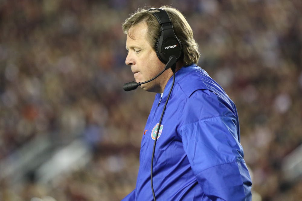 <p dir="ltr">Florida football coach Jim McElwain paces the sideline during UF's 31-13 loss against Florida State on Nov. 26, 2016, in Tallahassee.</p>