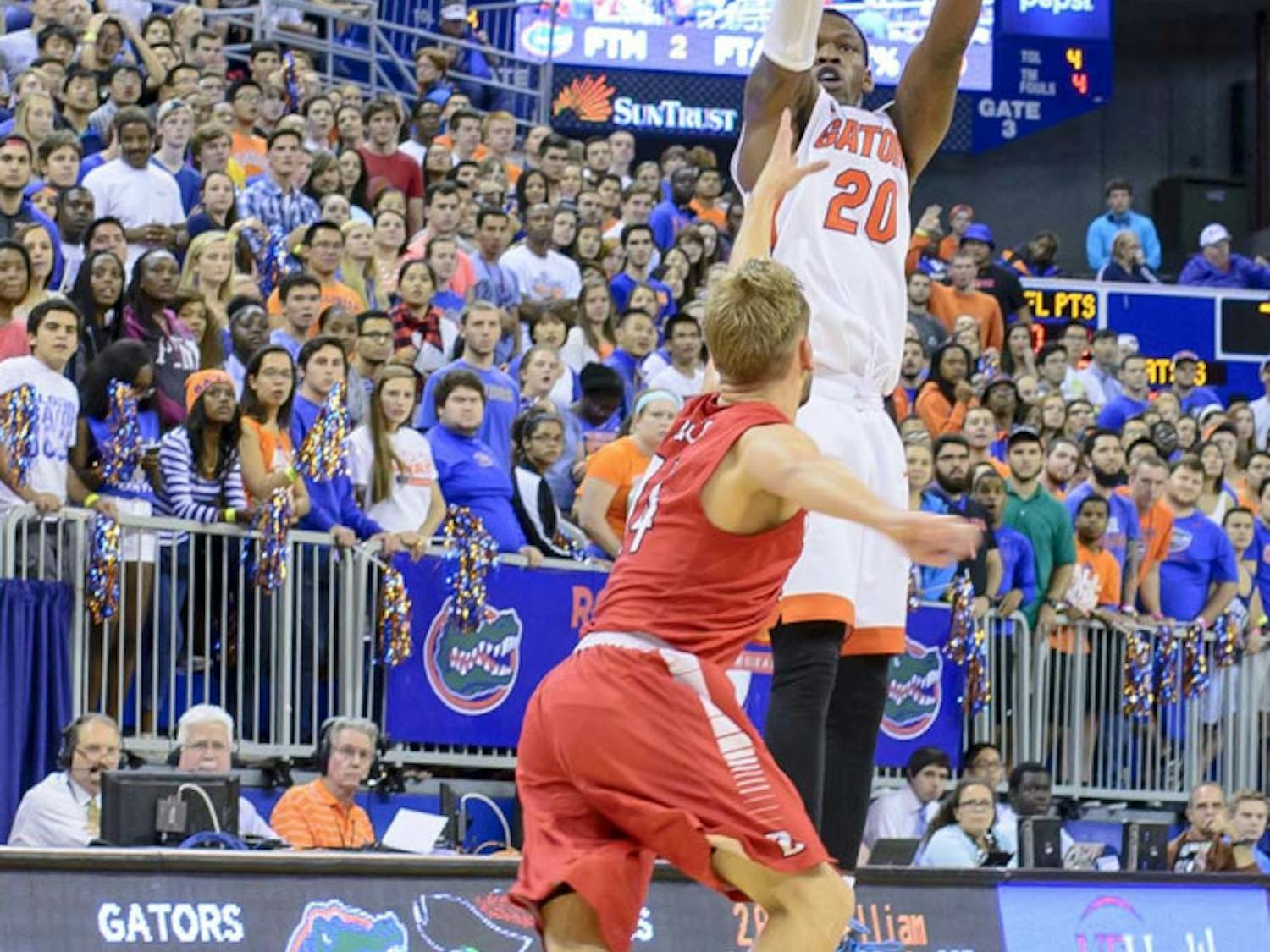 Michael Frazier II attempts a three-point shot during Florida's 79-70 exhibition win against Barry on Nov. 6.
